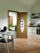 Pesaro Oak Pre-Finished Clear Glazed Internal Doors In Situ